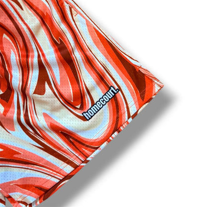 Mesh shorts: orange swirl