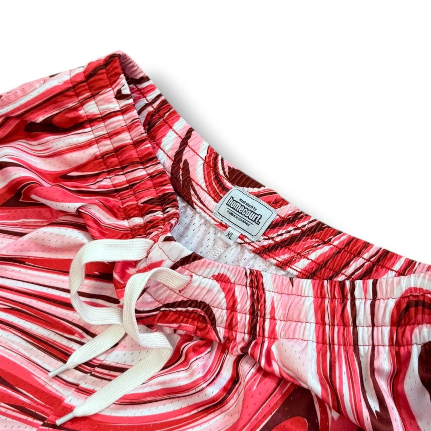 Mesh shorts: red swirl